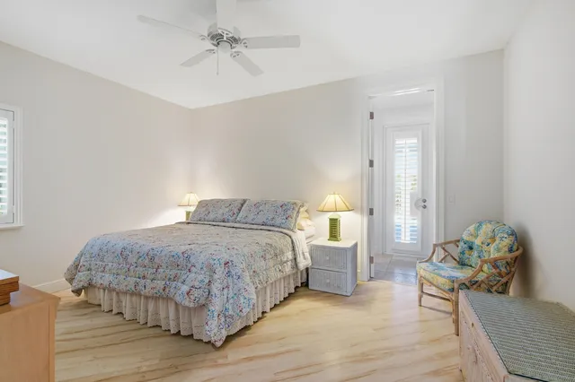 a kitchen with stainless steel appliances granite countertop a sink and a refrigerator