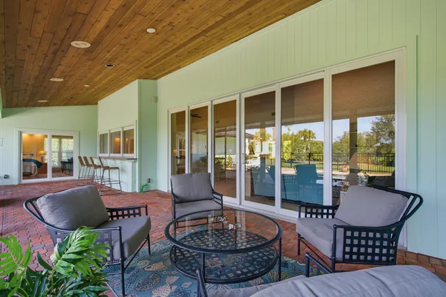 a group of people sitting in a living room