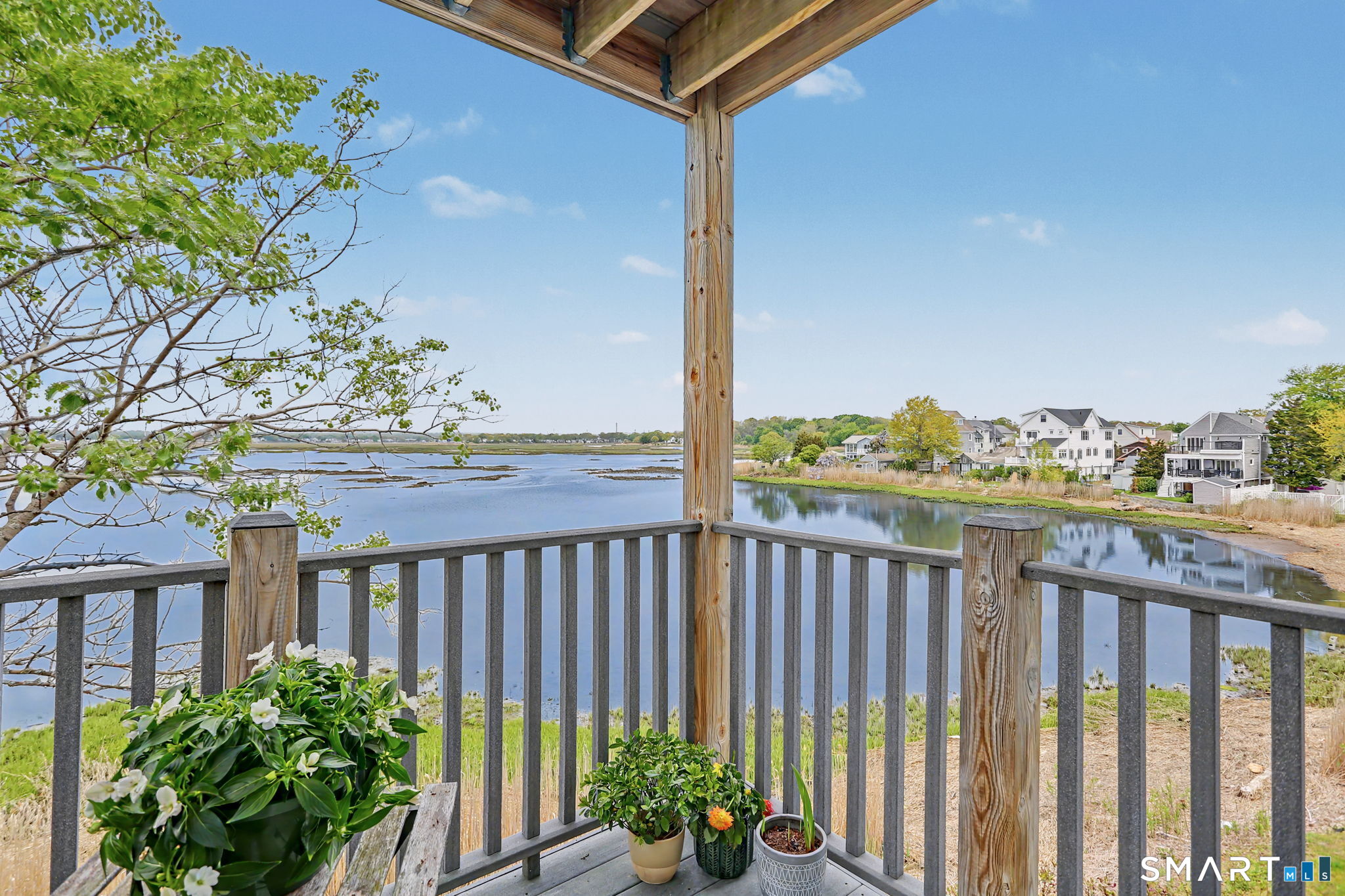 28 Milford Point Road Milford, CT 06460 - Photo 8 of 40 Deck off the Living Room overlooking Wheeler Marsh.