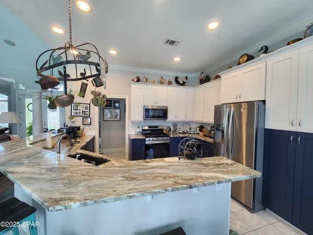 $624,500 | 140 Palm Grove Boulevard, Panama City Beach, FL 32408