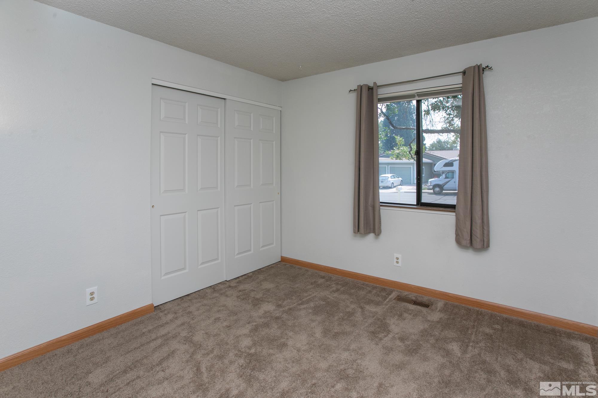 5335 Seville Court Reno, NV 89523 - Photo 20 of 31 an empty room with windows
