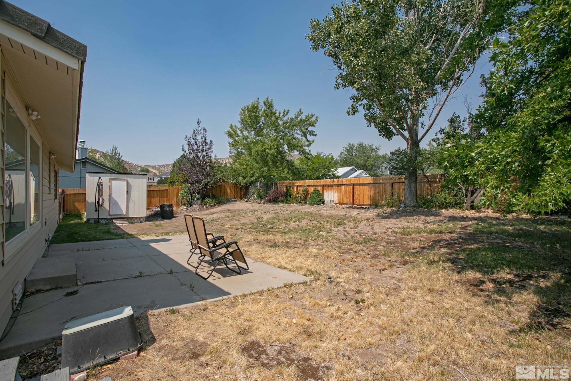5335 Seville Court Reno, NV 89523 - Photo 28 of 31 a view of a house with a yard