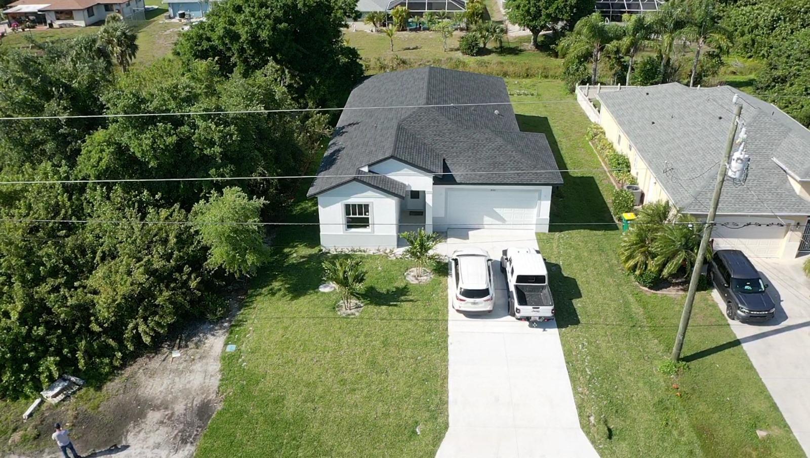 500 Sunset Road North Rotonda West, FL 33947 - Photo 2 of 25 an aerial view of a house