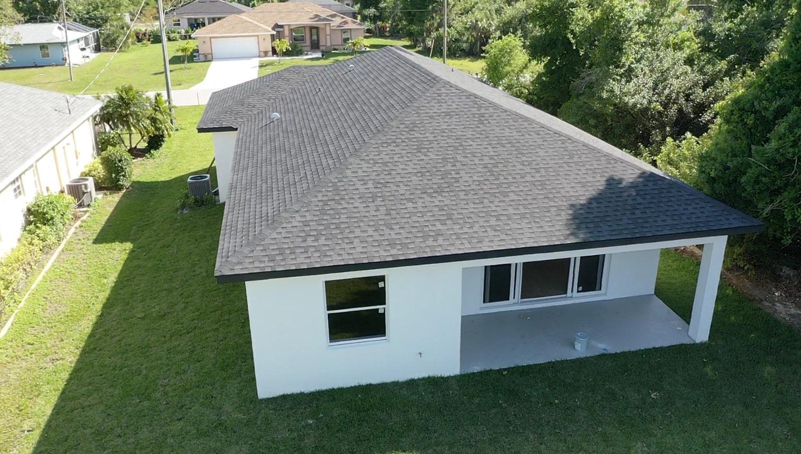 500 Sunset Road North Rotonda West, FL 33947 - Photo 24 of 25 an aerial view of a house with yard porch and sitting area