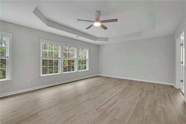 an aerial view of a houses with yard