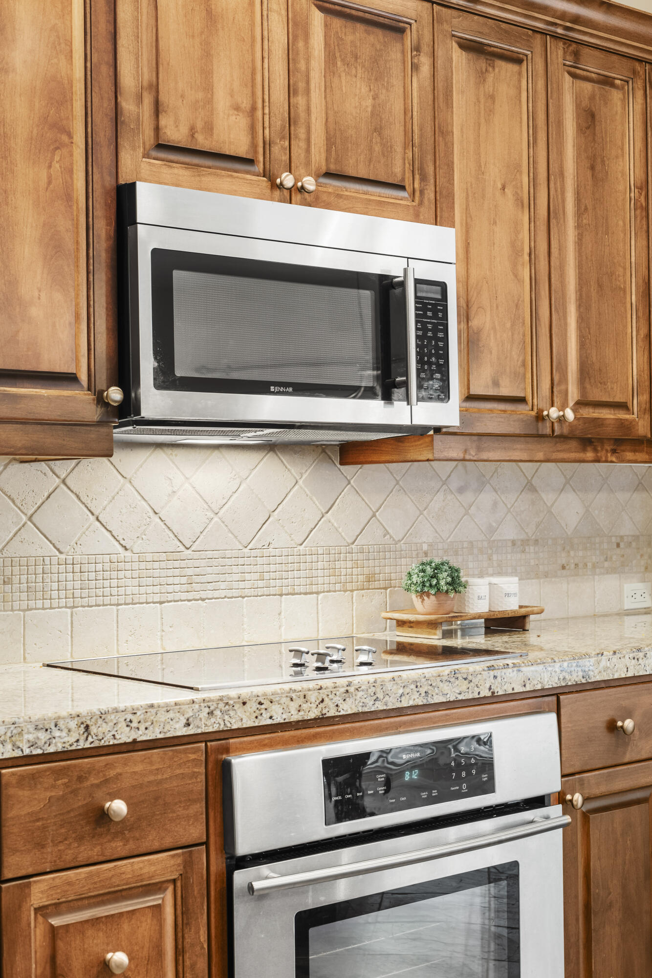784 Ribbon Falls Road Redmond, OR 97756 - Photo 27 of 79 a stove top oven sitting inside of a kitchen