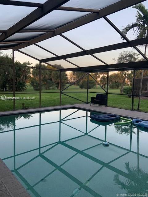 19625 Back 9 Drive Boca Raton, FL 33498 - Photo 3 of 13 a view of outdoor space with furniture