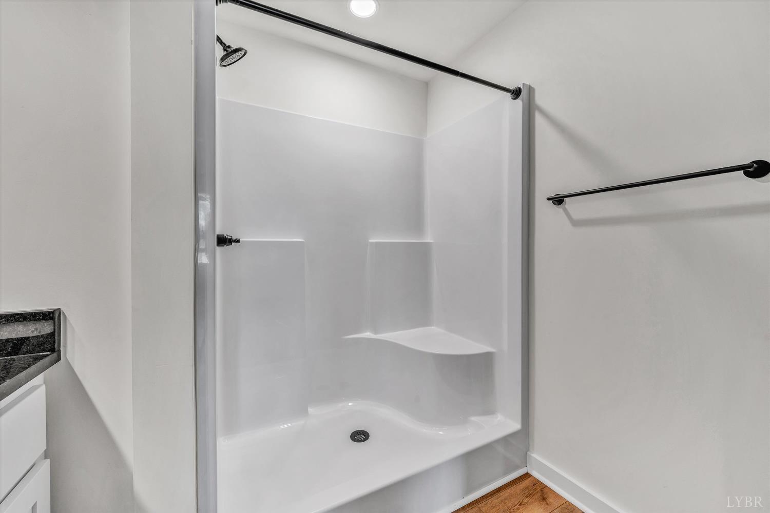 1484 White House Road Moneta, VA 24121 - Photo 16 of 27 a bathroom with a glass shower door