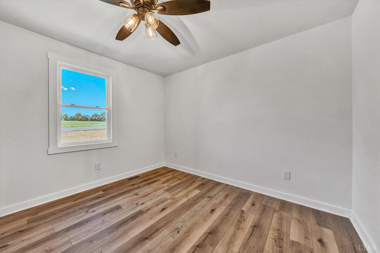 1484 White House Road Moneta, VA 24121 - Photo 17 of 27 a view of room with window and ceiling fan
