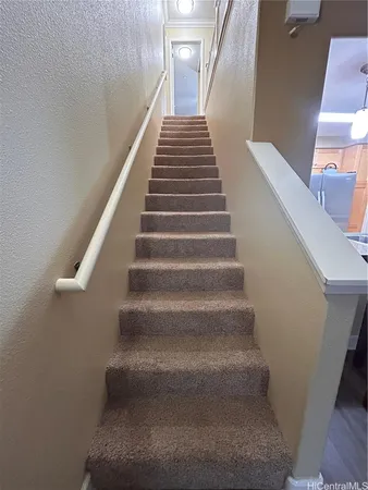 a view of a hallway with closet area
