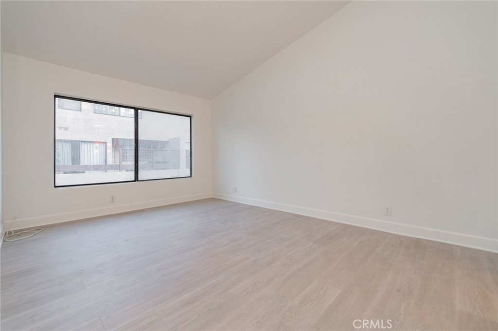 20 Rock Cliff Place Phillips Ranch, CA 91766 - Photo 11 of 17 an empty room with a window
