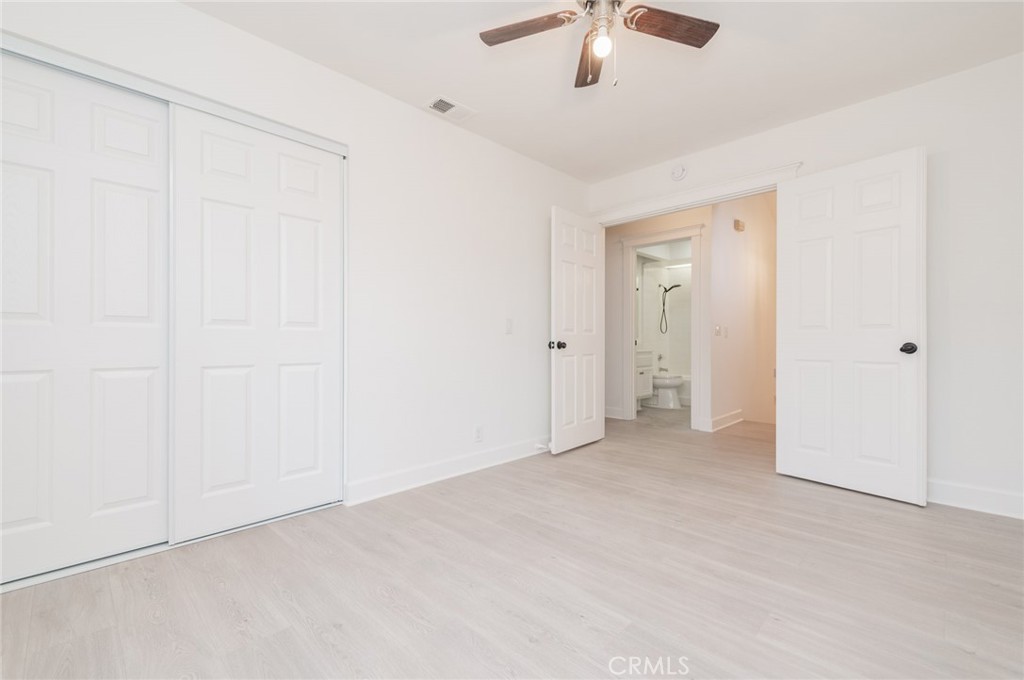 20 Rock Cliff Place Phillips Ranch, CA 91766 - Photo 9 of 17 an empty room with chandelier fan