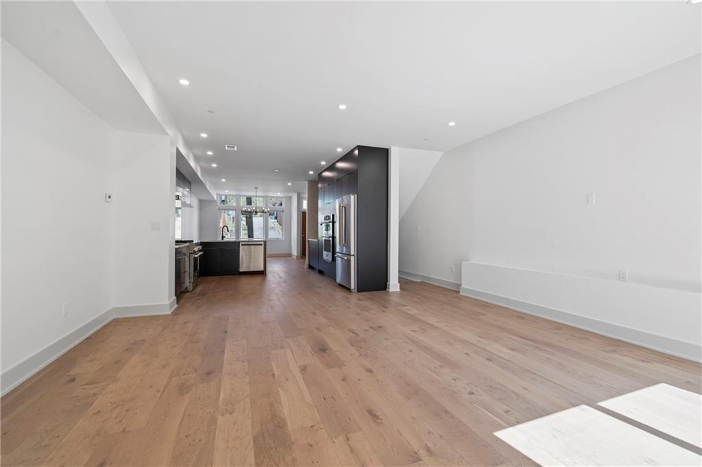 226 38th Street Pittsburgh, PA 15201 - Photo 14 of 42 a view of empty room with wooden floor