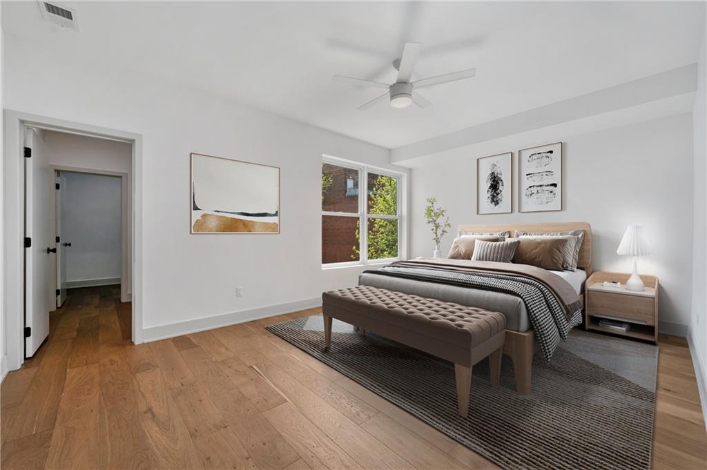 226 38th Street Pittsburgh, PA 15201 - Photo 19 of 42 a bedroom with a bed and a window