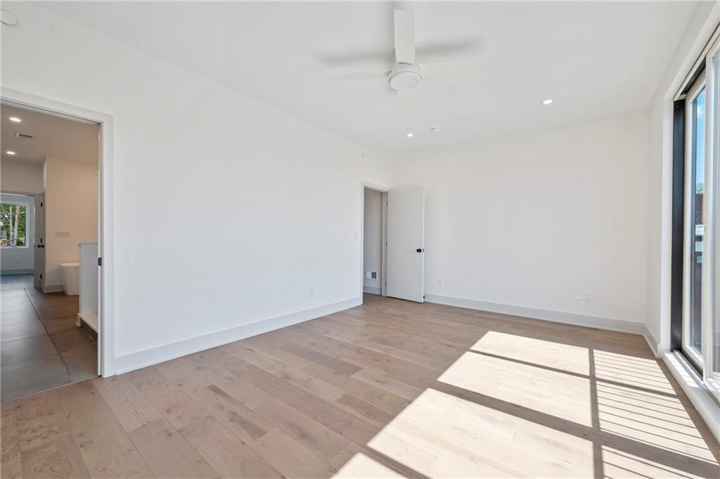 226 38th Street Pittsburgh, PA 15201 - Photo 34 of 42 wooden floor in an empty room with a window