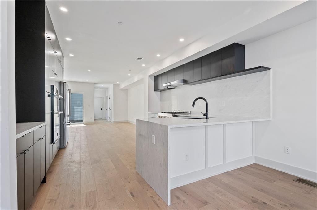 226 38th Street Pittsburgh, PA 15201 - Photo 9 of 42 a bathroom with a sink and a mirror