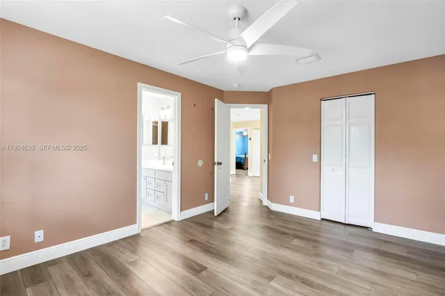 a view of a swimming pool with a patio and a yard
