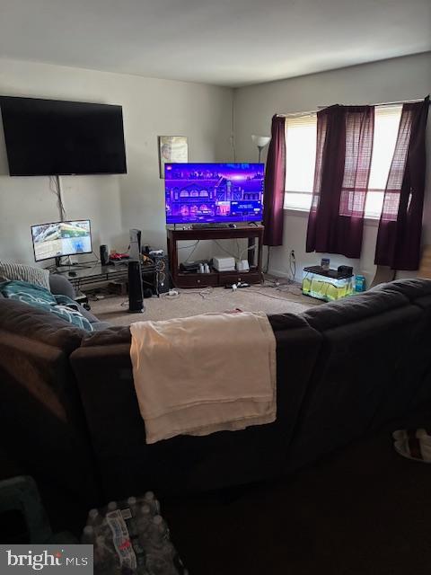 6805 Rutland Street Philadelphia, PA 19149 - Photo 13 of 23 a room with furniture a flat screen tv and a window