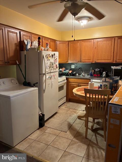 6805 Rutland Street Philadelphia, PA 19149 - Photo 14 of 23 a kitchen with a table chairs and a refrigerator