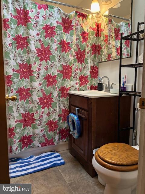 6805 Rutland Street Philadelphia, PA 19149 - Photo 17 of 23 a bathroom with a toilet and a sink