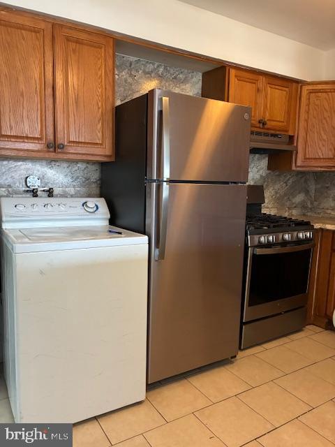 6805 Rutland Street Philadelphia, PA 19149 - Photo 5 of 23 a utility room with dryer and washer