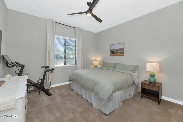 a spacious bathroom with a double vanity sink a mirror and shower