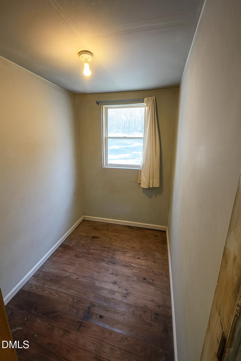 194 Jack Alston Road Pittsboro, NC 27312 - Photo 12 of 20 an empty room with a window