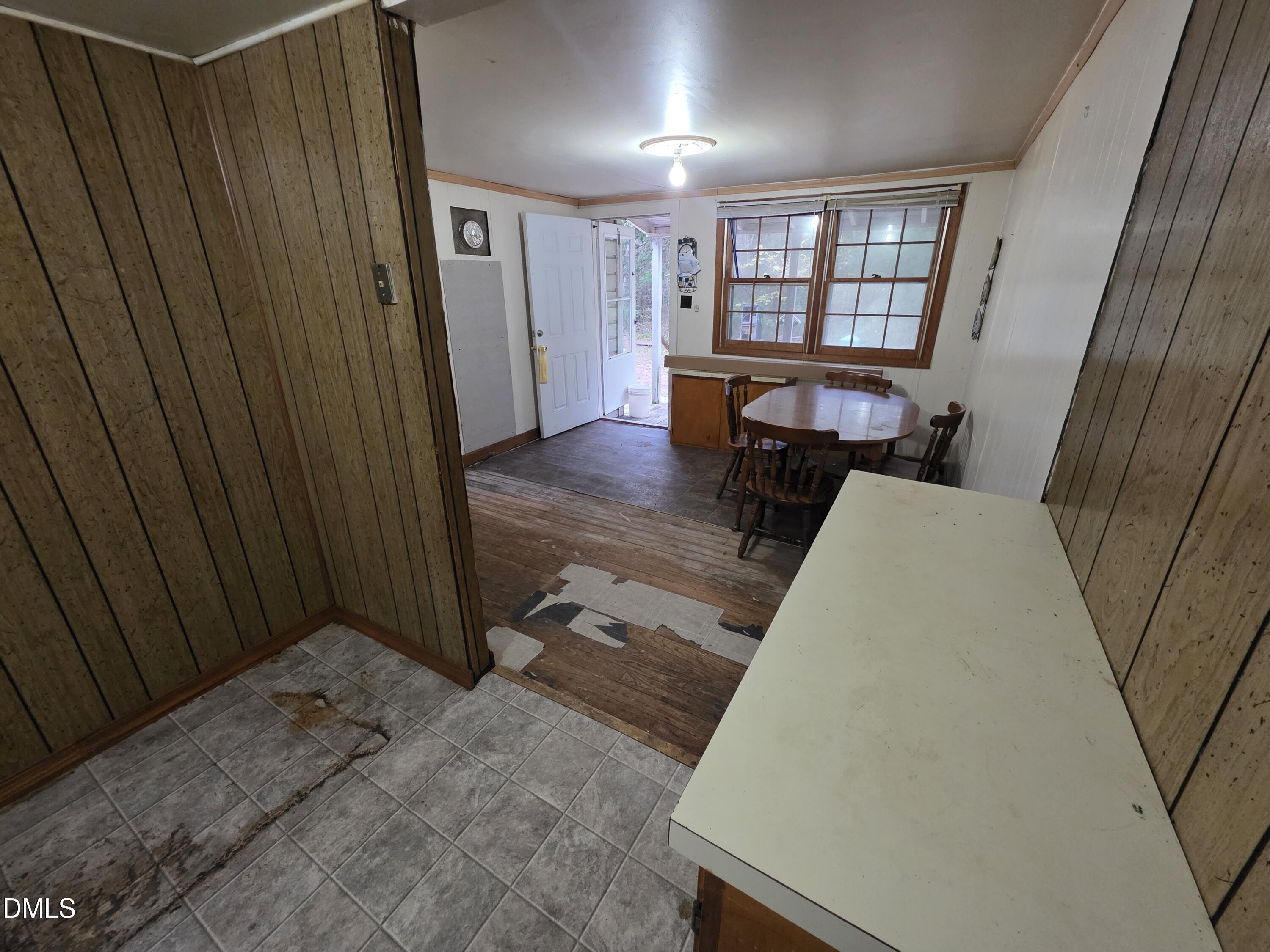 194 Jack Alston Road Pittsboro, NC 27312 - Photo 6 of 20 a view of a hallway with wooden floor and staircase