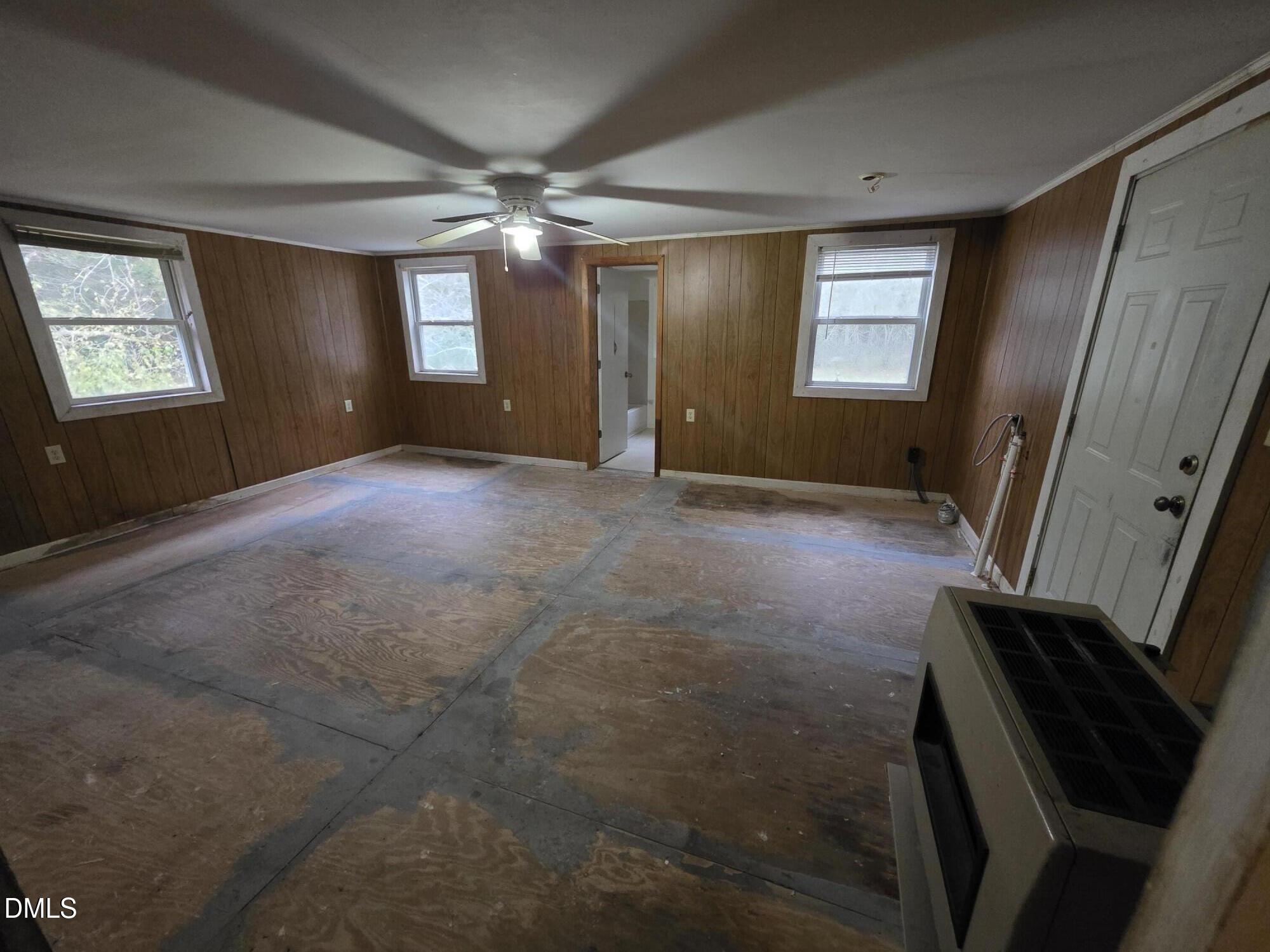 194 Jack Alston Road Pittsboro, NC 27312 - Photo 8 of 20 a view of an empty room with a window