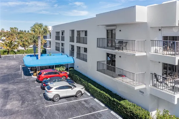 a play room with furniture and a book shelf