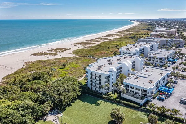 a view of an ocean with a mountain