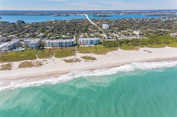 a view of a lake with a city