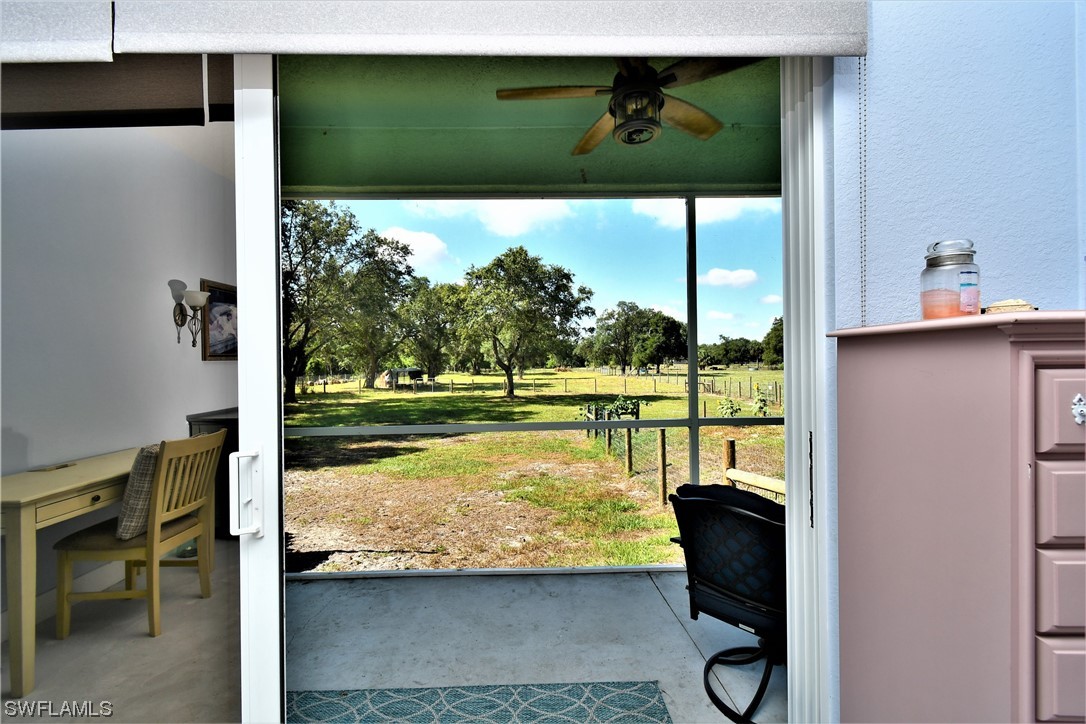 23170 North River Road Alva, FL 33920 - Photo 20 of 50 a view of a lake from a living room