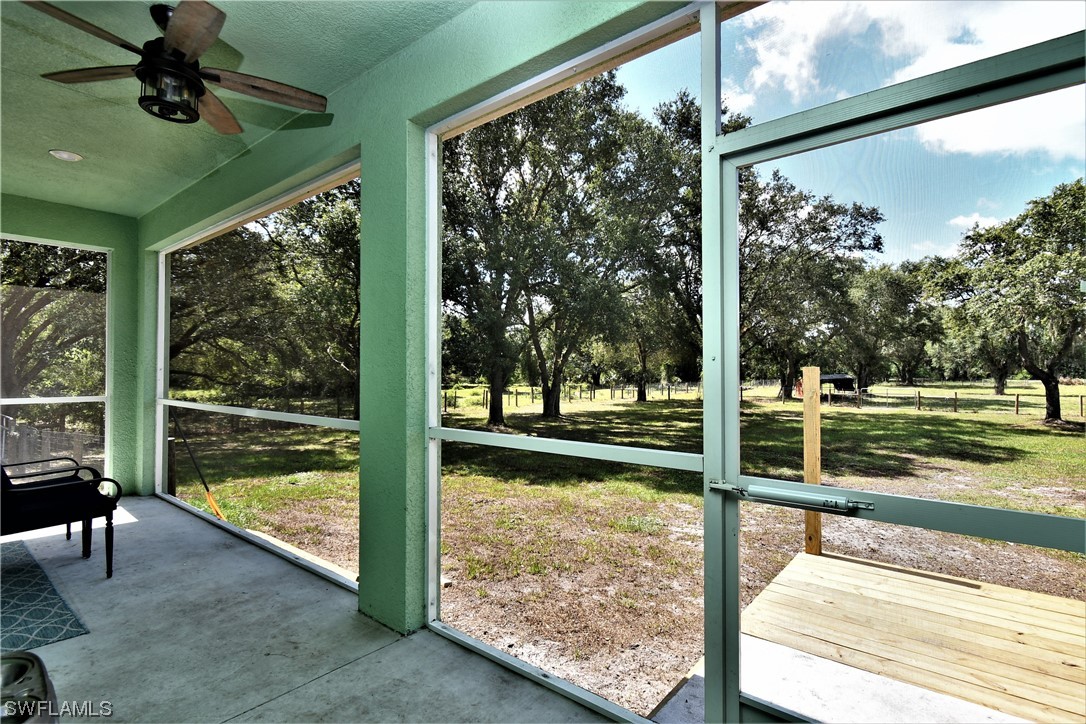 23170 North River Road Alva, FL 33920 - Photo 32 of 50 a view of porch with a large window