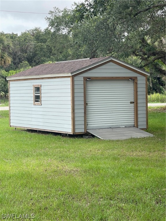 23170 North River Road Alva, FL 33920 - Photo 4 of 50 a backyard of a house with lots of green space