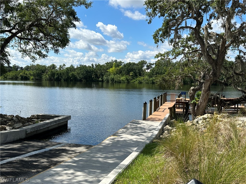 23170 North River Road Alva, FL 33920 - Photo 47 of 50 a view of a lake with houses