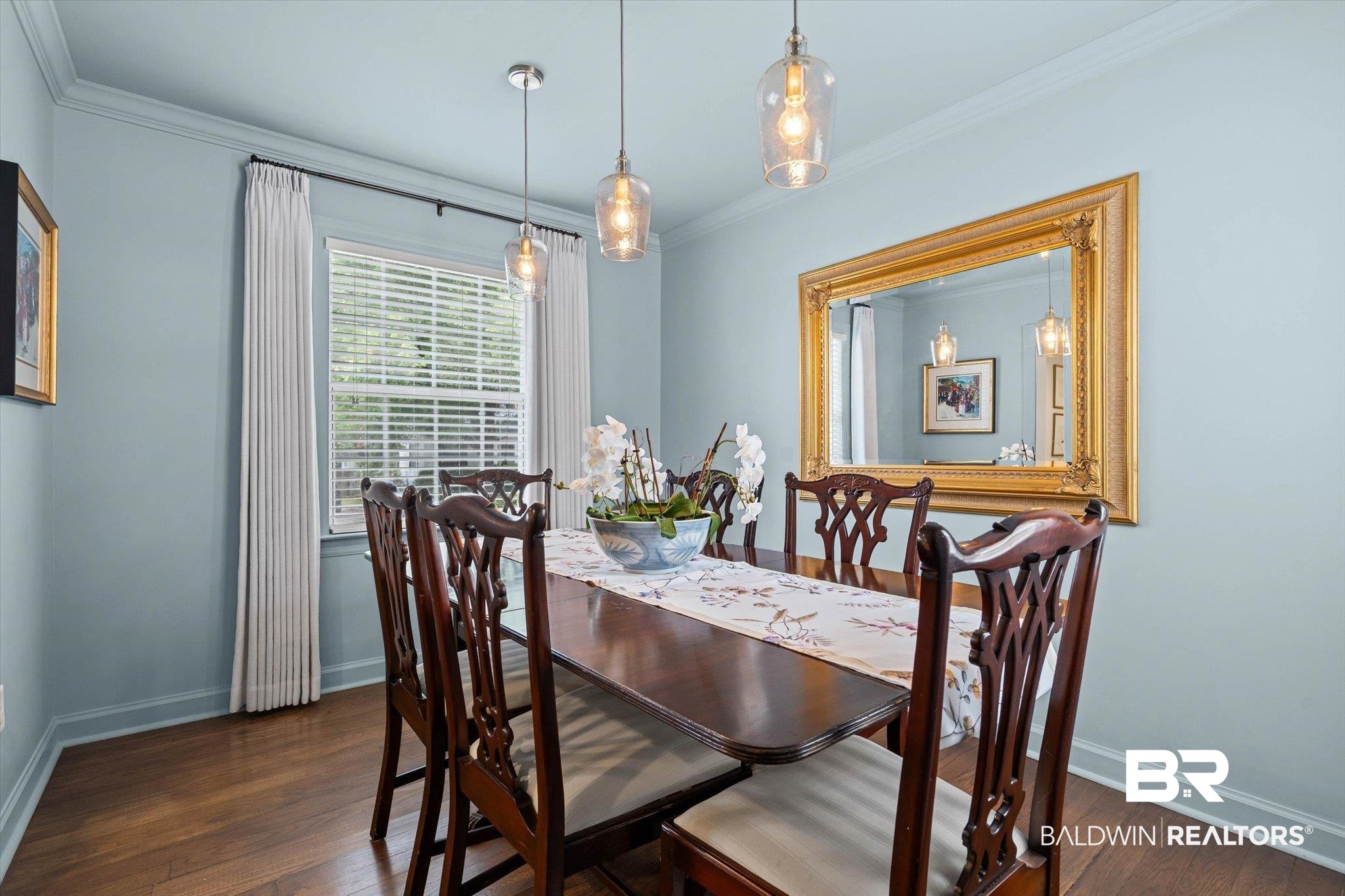 77 North Hathaway Road Mobile, AL 36608 - Photo 8 of 33 Dining space with crown molding and dark wood finished floors