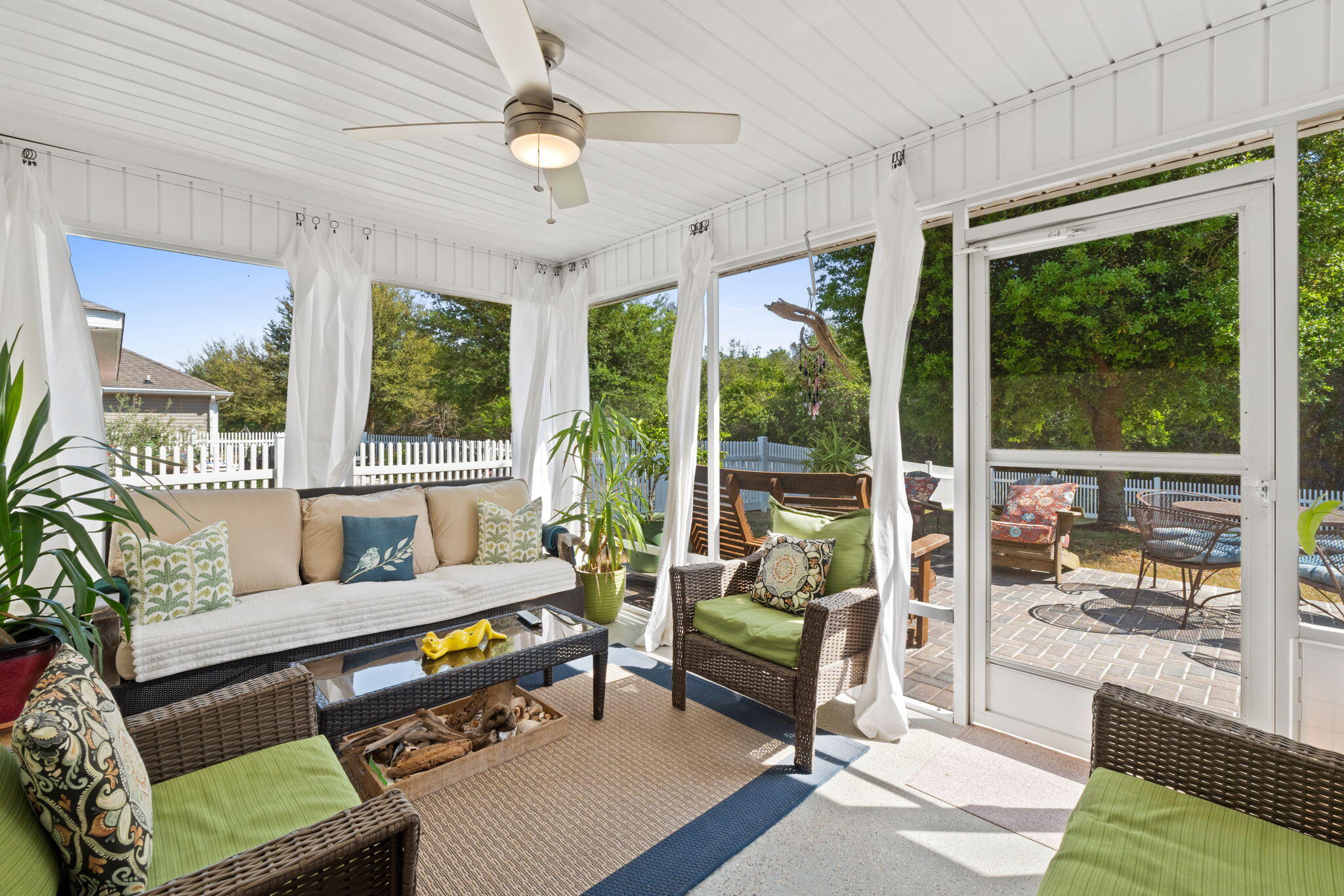 587 Fanny Ann Way Freeport, FL 32439 - Photo 1 of 78 a living room with furniture and a large window with garden view