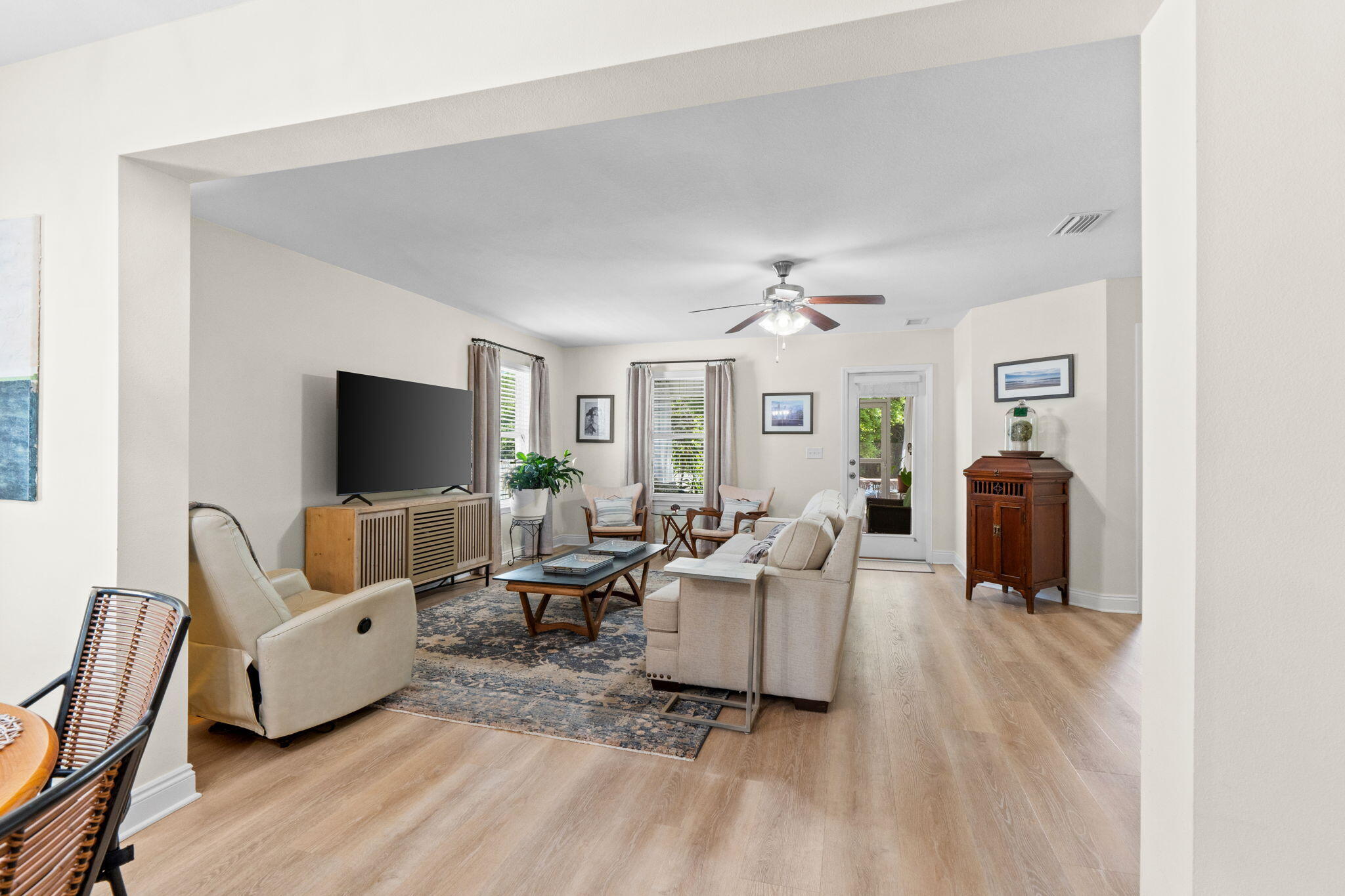 587 Fanny Ann Way Freeport, FL 32439 - Photo 14 of 78 a living room with furniture a flat screen tv and a window