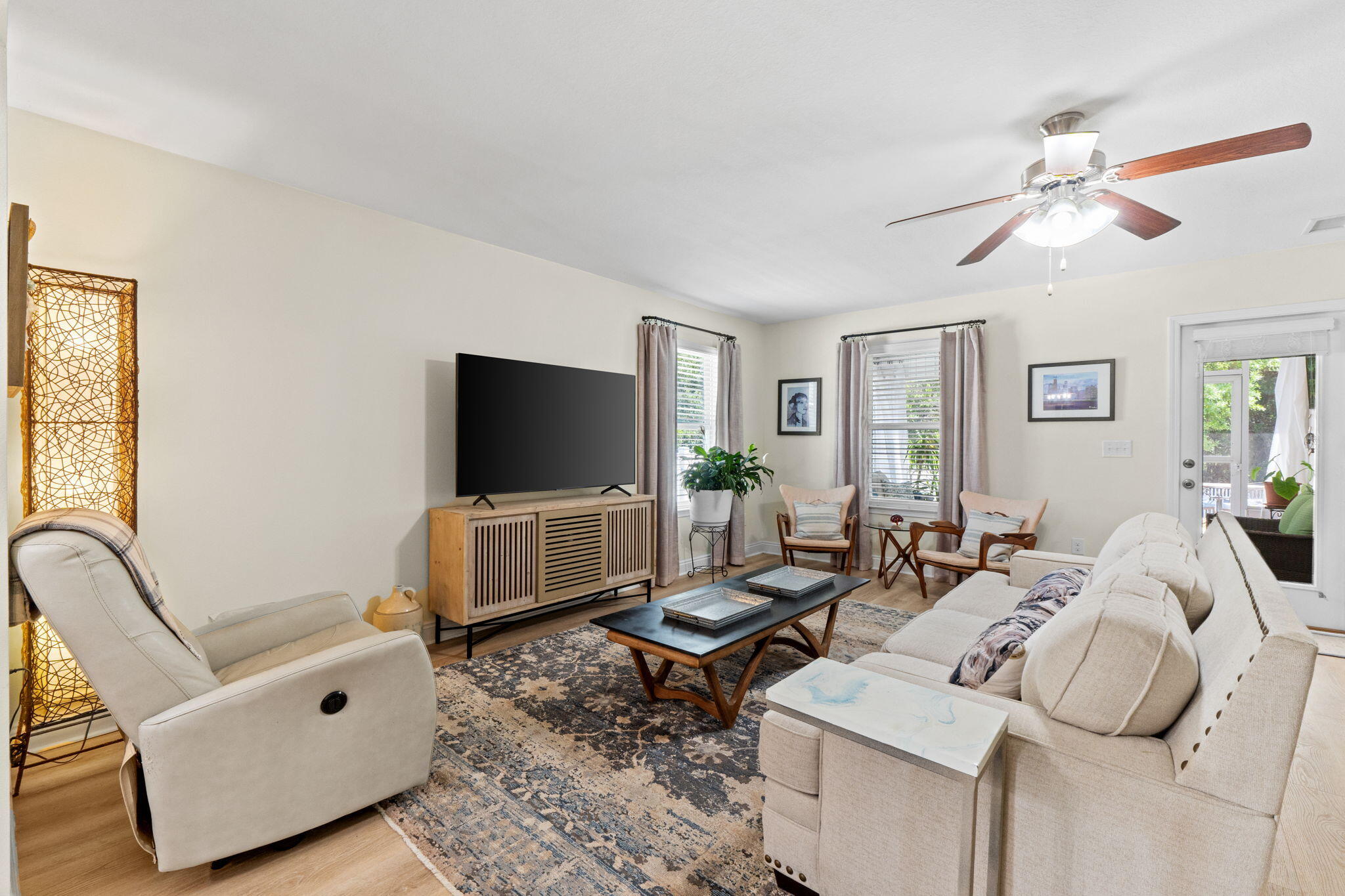 587 Fanny Ann Way Freeport, FL 32439 - Photo 15 of 78 a living room with furniture a window and a flat screen tv