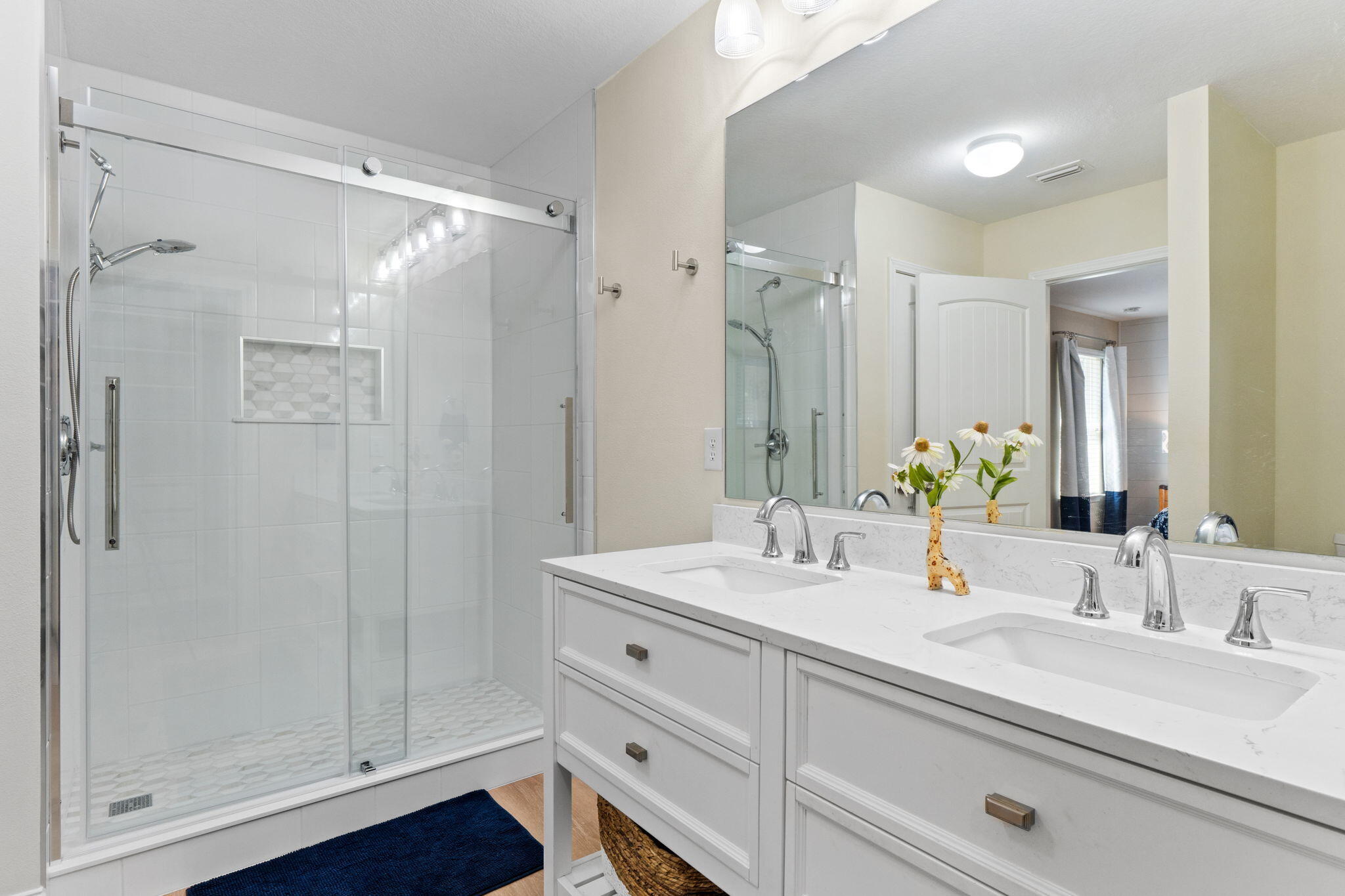 587 Fanny Ann Way Freeport, FL 32439 - Photo 27 of 78 a bathroom with a double vanity sink mirror and shower