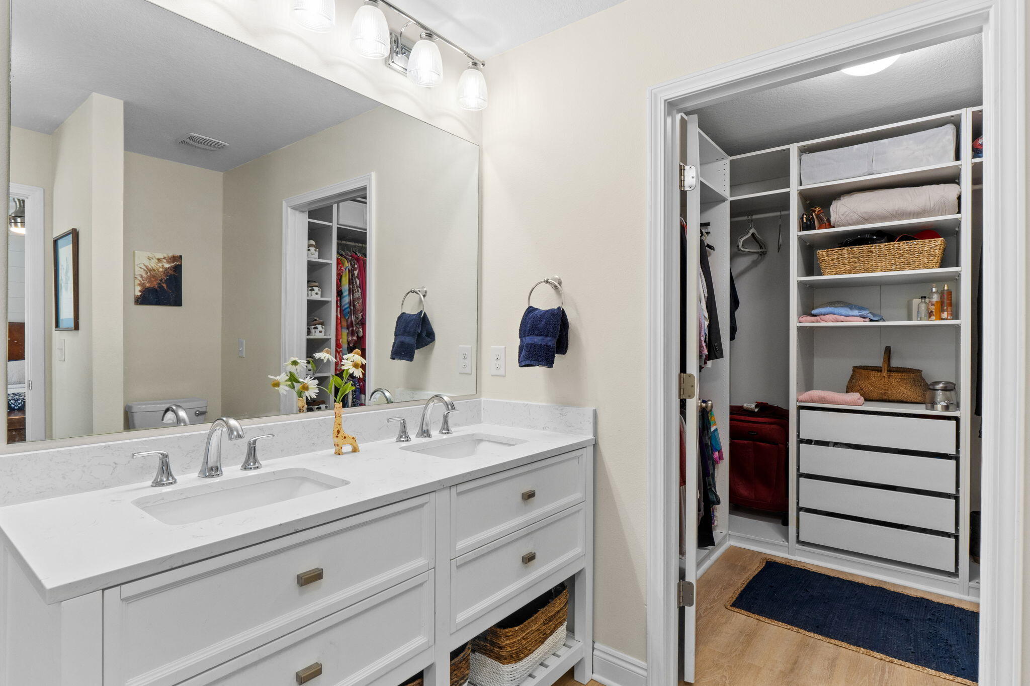 587 Fanny Ann Way Freeport, FL 32439 - Photo 28 of 78 a bathroom with a sink double vanity and a mirror