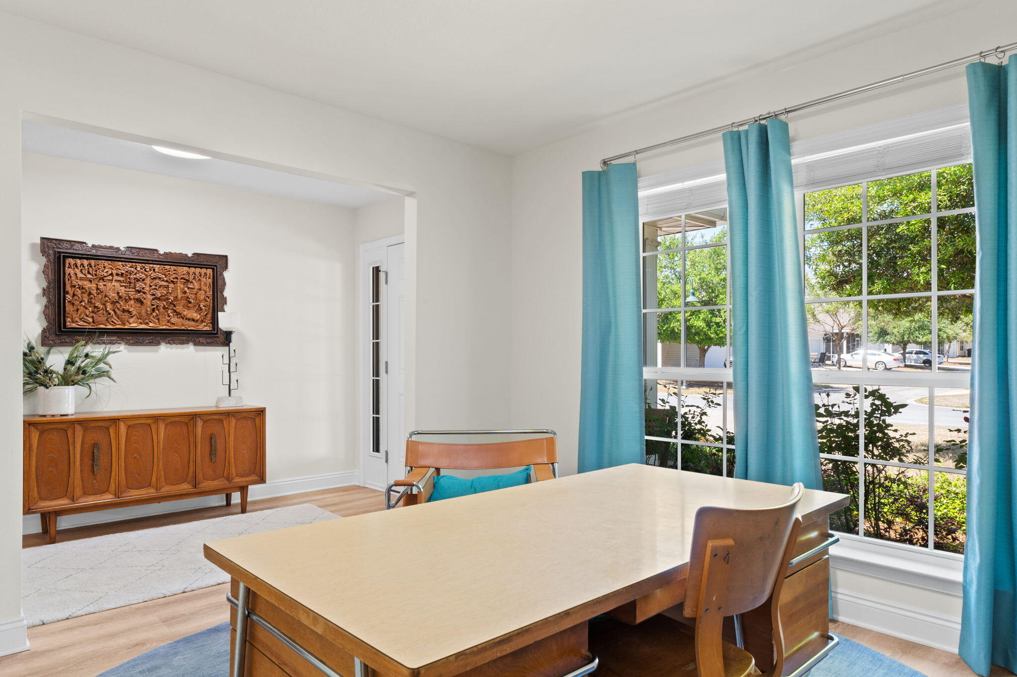 587 Fanny Ann Way Freeport, FL 32439 - Photo 31 of 78 a view of a dining room with furniture window and wooden floor