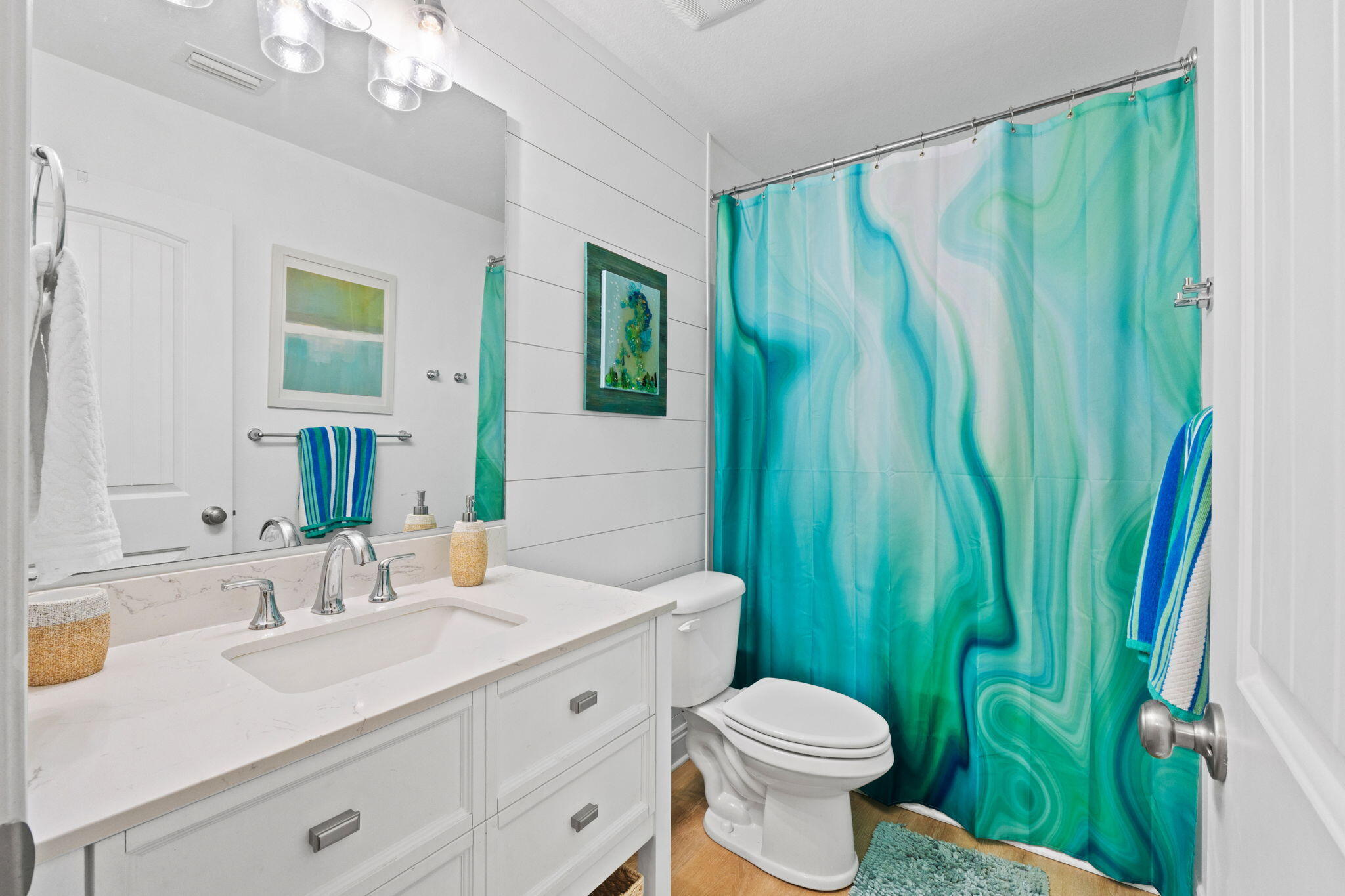 587 Fanny Ann Way Freeport, FL 32439 - Photo 34 of 78 a bathroom with a sink a toilet and a mirror