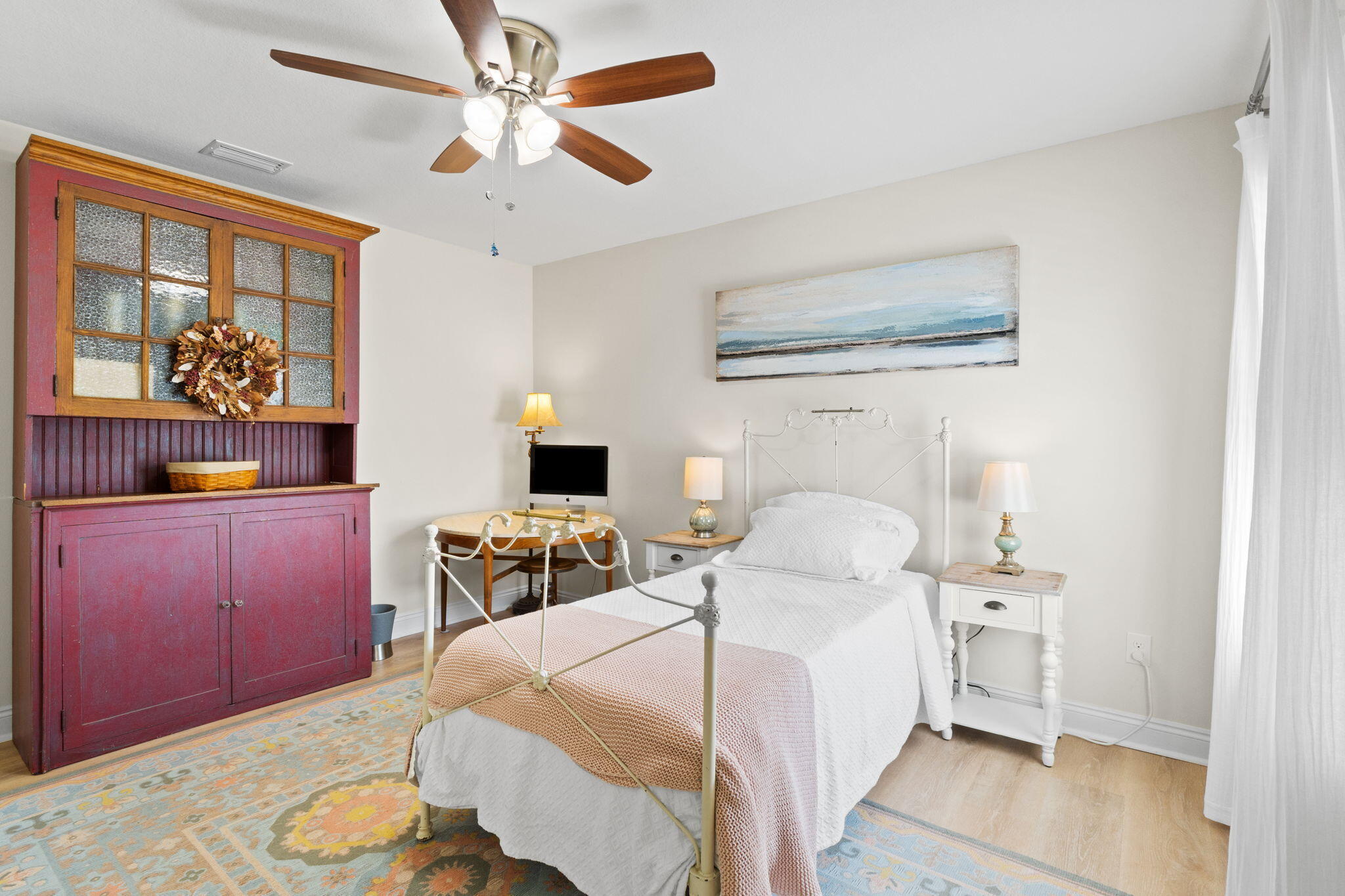 587 Fanny Ann Way Freeport, FL 32439 - Photo 37 of 78 a bedroom with a bed and wooden floor