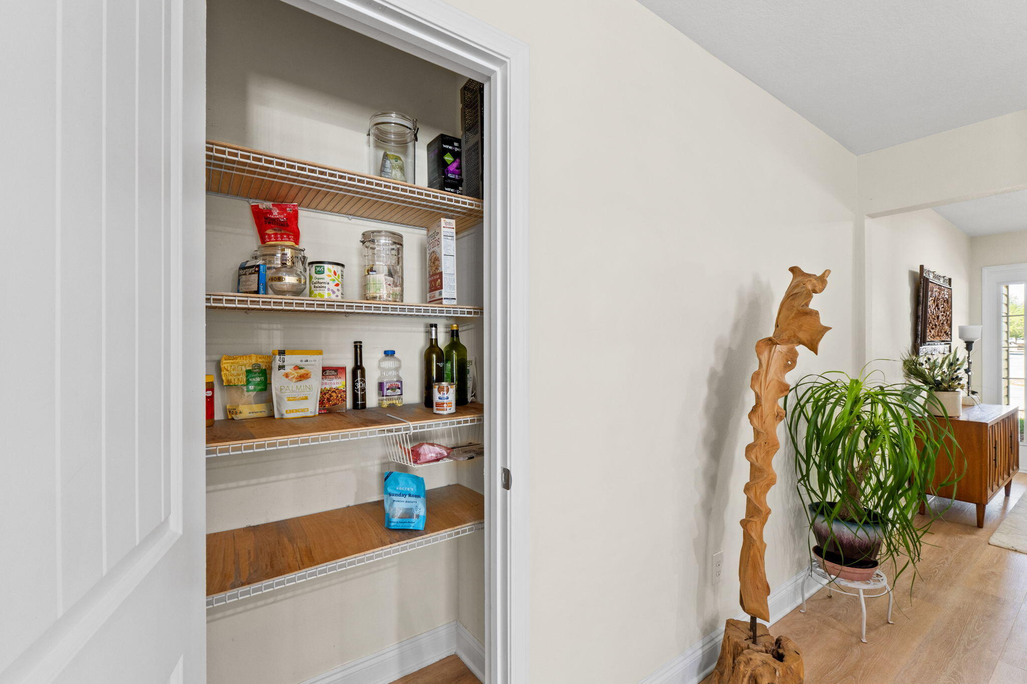 587 Fanny Ann Way Freeport, FL 32439 - Photo 41 of 78 a shelf with books and knick knacks on it