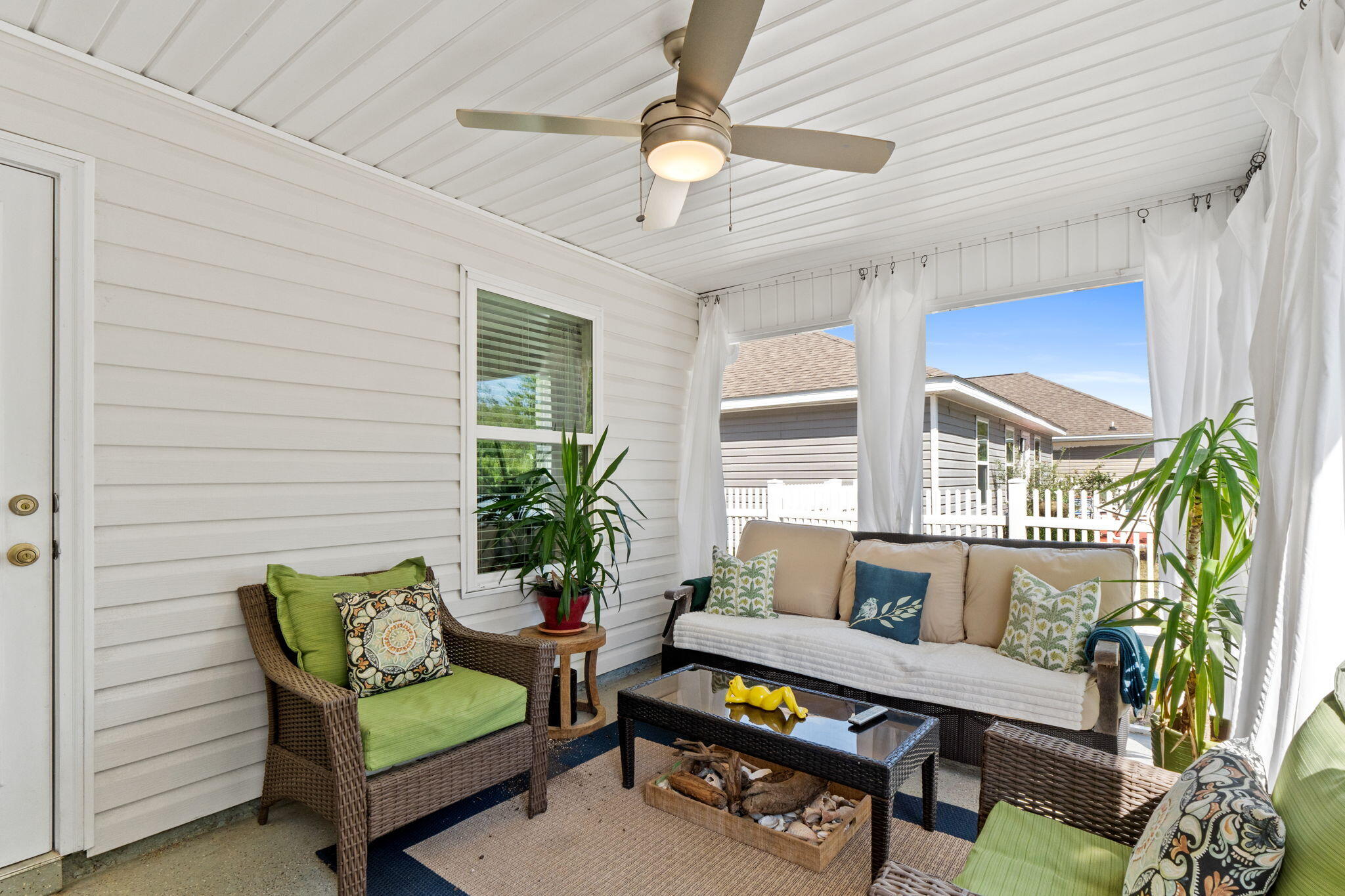 587 Fanny Ann Way Freeport, FL 32439 - Photo 45 of 78 a living room with furniture and a potted plant