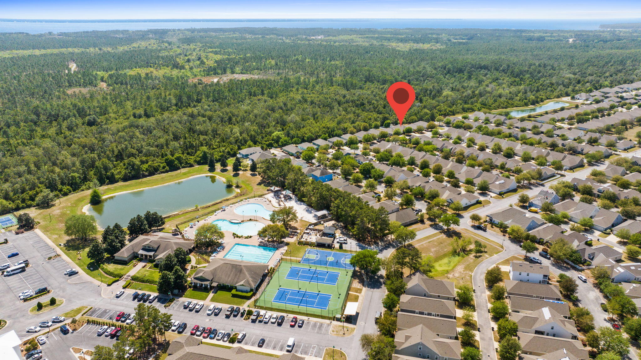 587 Fanny Ann Way Freeport, FL 32439 - Photo 55 of 78 an aerial view of swimming pool patio and mountain view in back