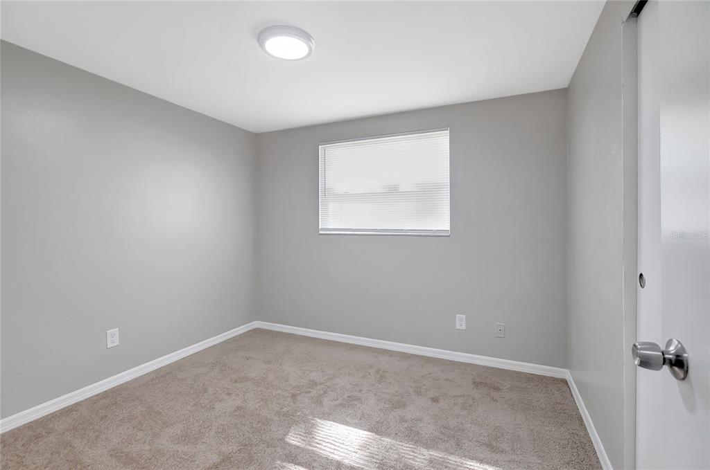 5605 Oceanic Road Holiday, FL 34690 - Photo 17 of 36 an empty room with a window