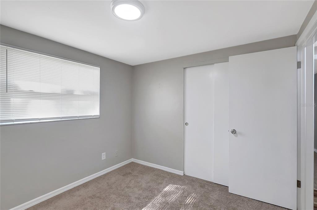 5605 Oceanic Road Holiday, FL 34690 - Photo 18 of 36 a view of an empty room with a window